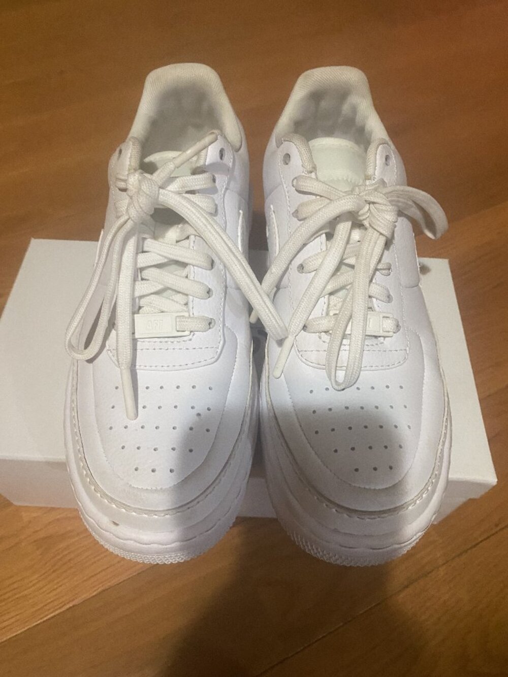 Women pair of Nike Air Force 1 all white size 7 leather